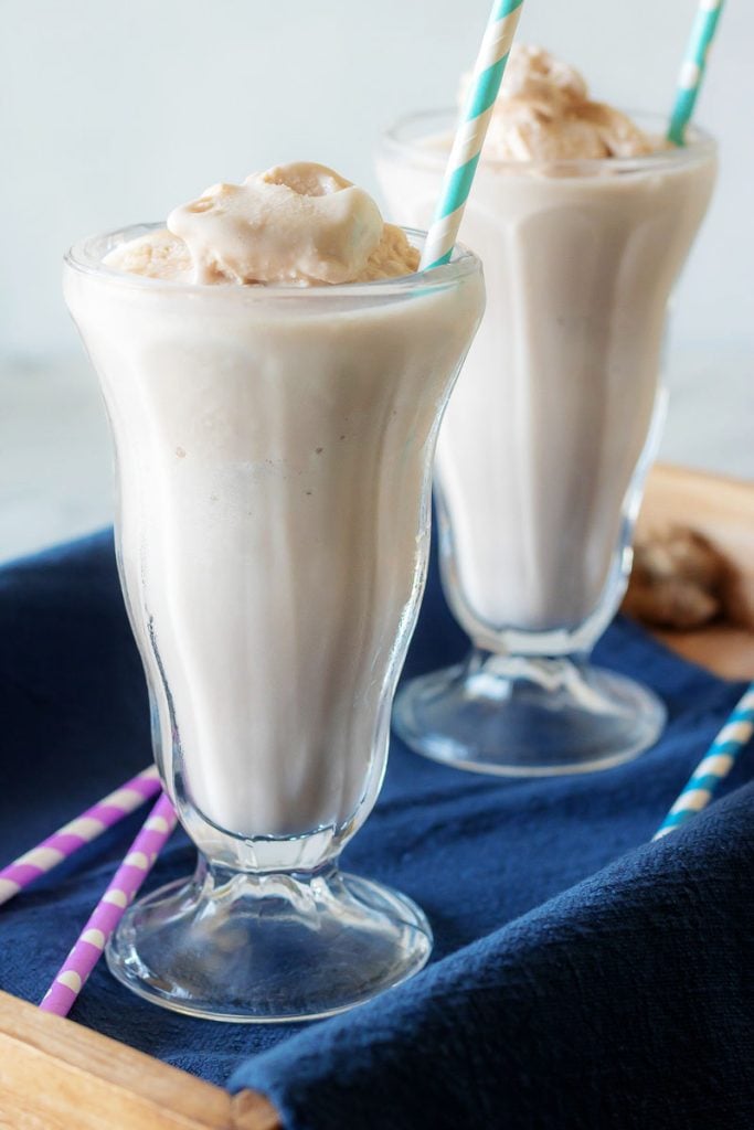 Copy Cat Wendy's Frosty in two high milkshake glasses with teal striped straws