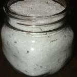 lemon rosemary bath salts in a small glass mason jar