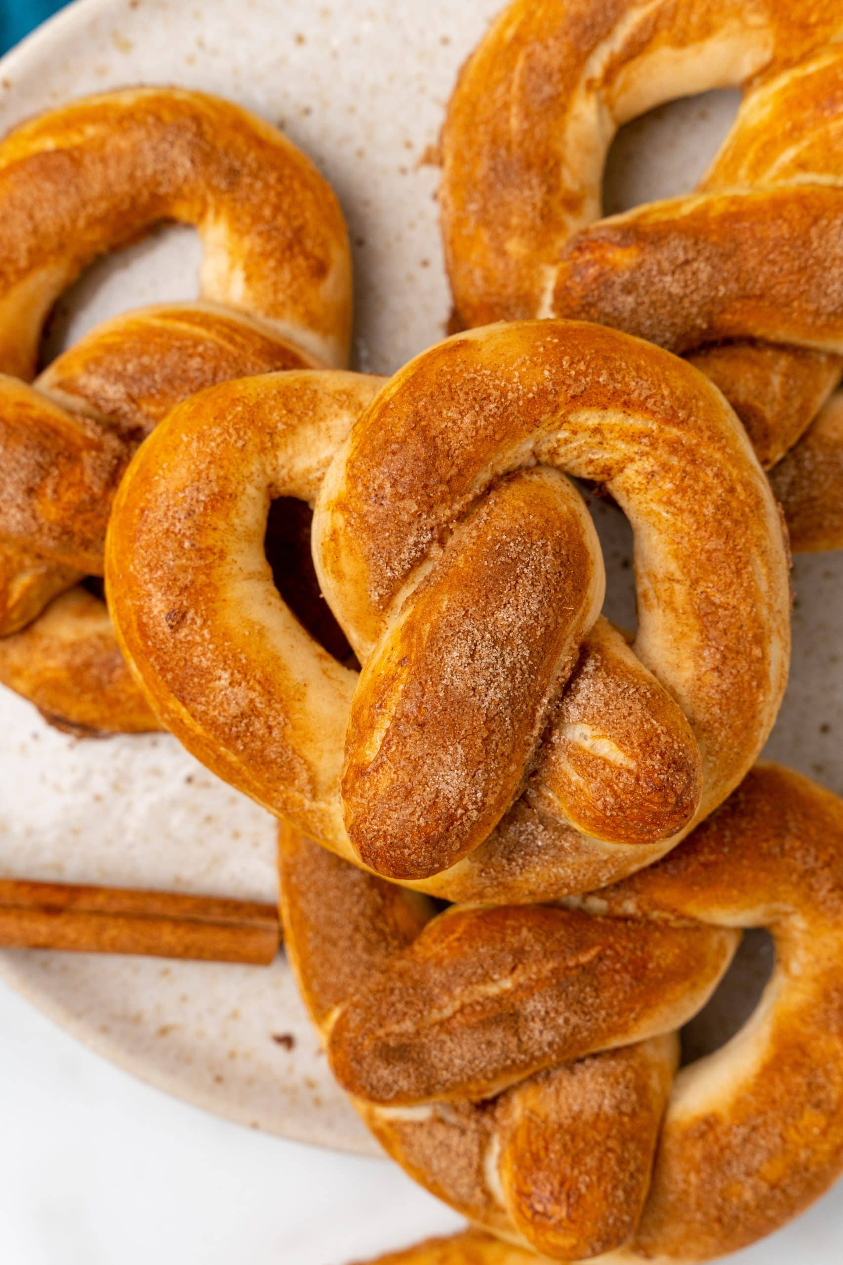 sugar sprinkled 30 minute soft pretzels piled on a white plate