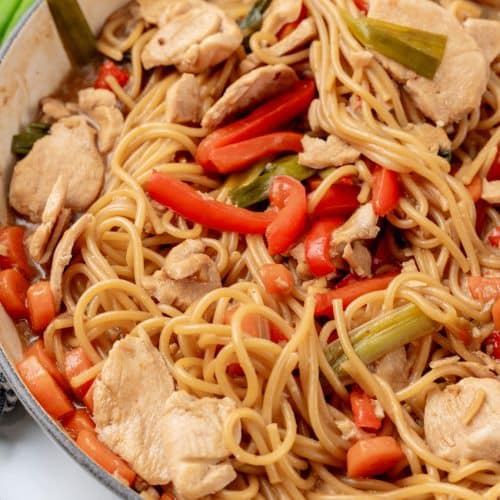 one pot chicken lo mein noodles in a cast iron skillet