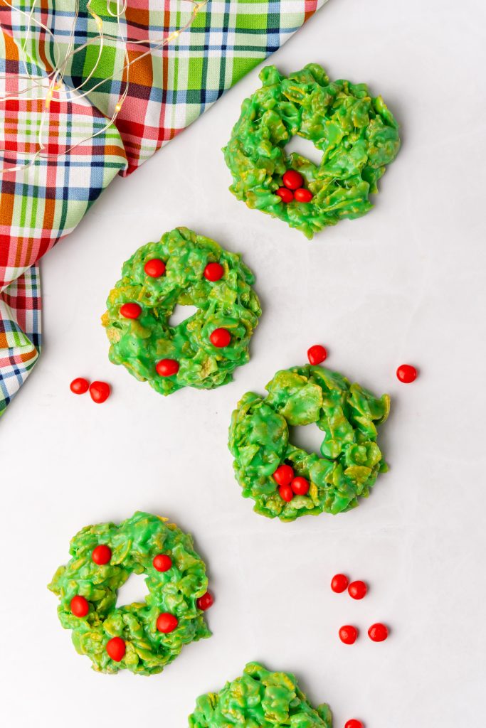 christmas wreath cookies on a white counter top