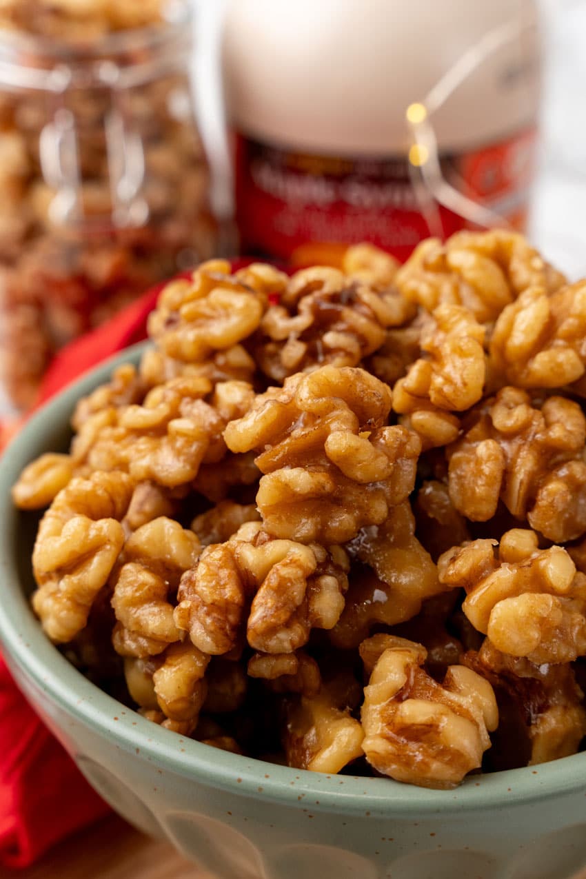 slow cooker maple walnuts in a small gray bowl