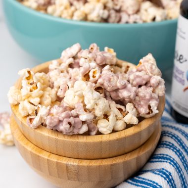 peanut butter and jelly popcorn in wooden bowls