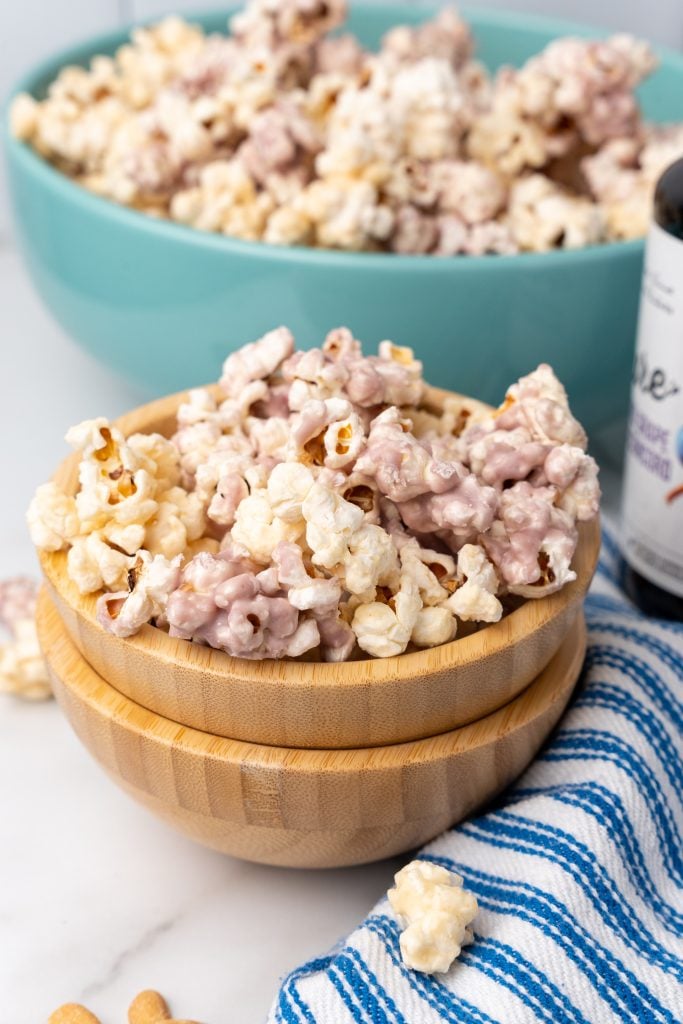peanut butter and jelly popcorn in wooden bowls
