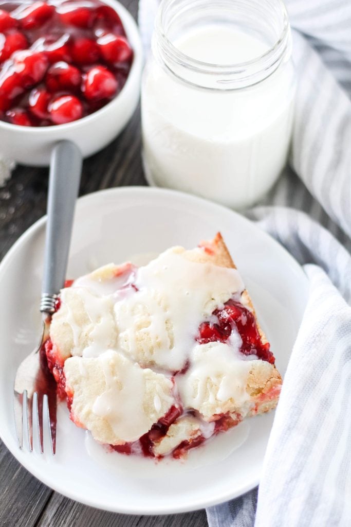 cherry pie bars served on a white plate