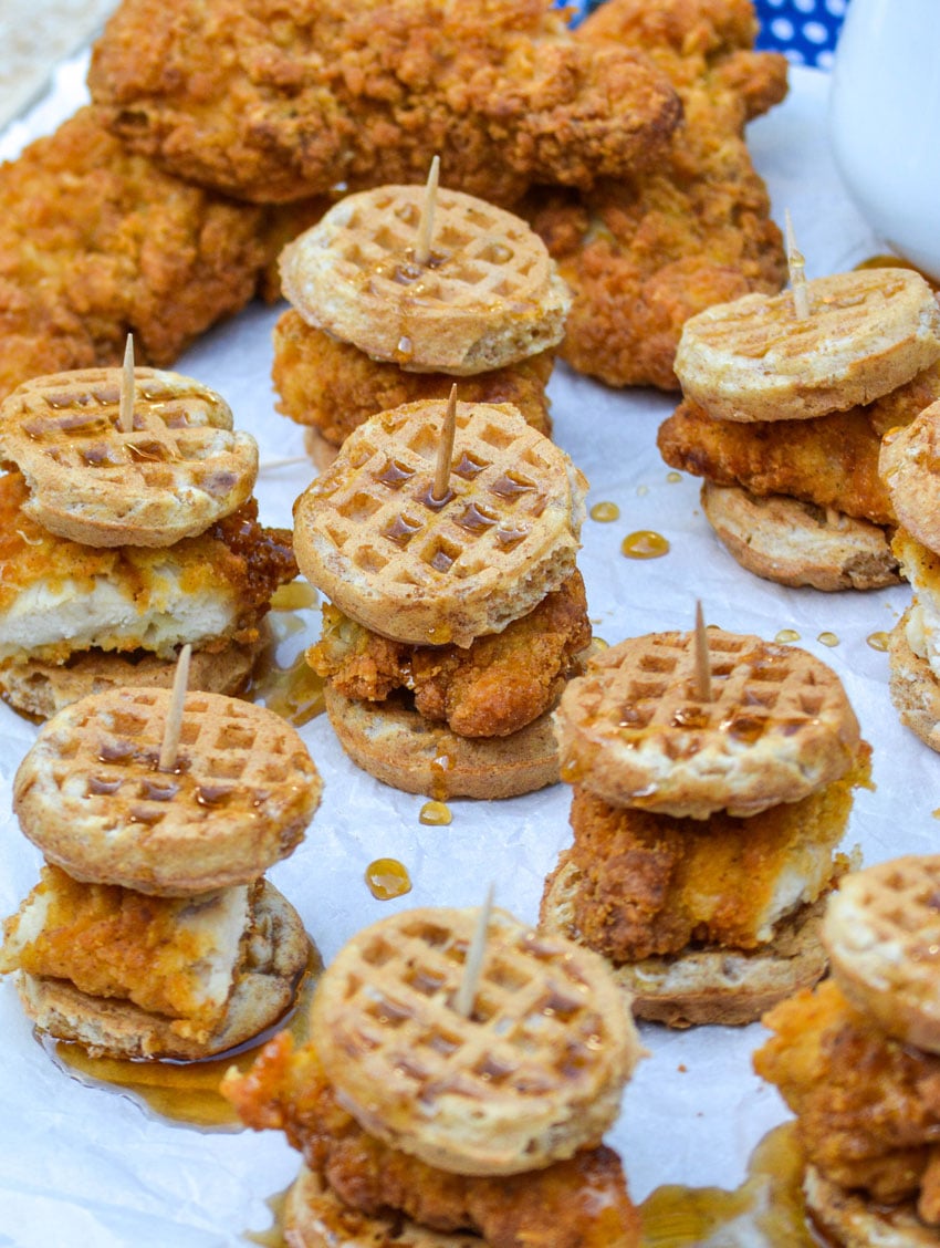 chicken and waffle sliders on white parchment paper