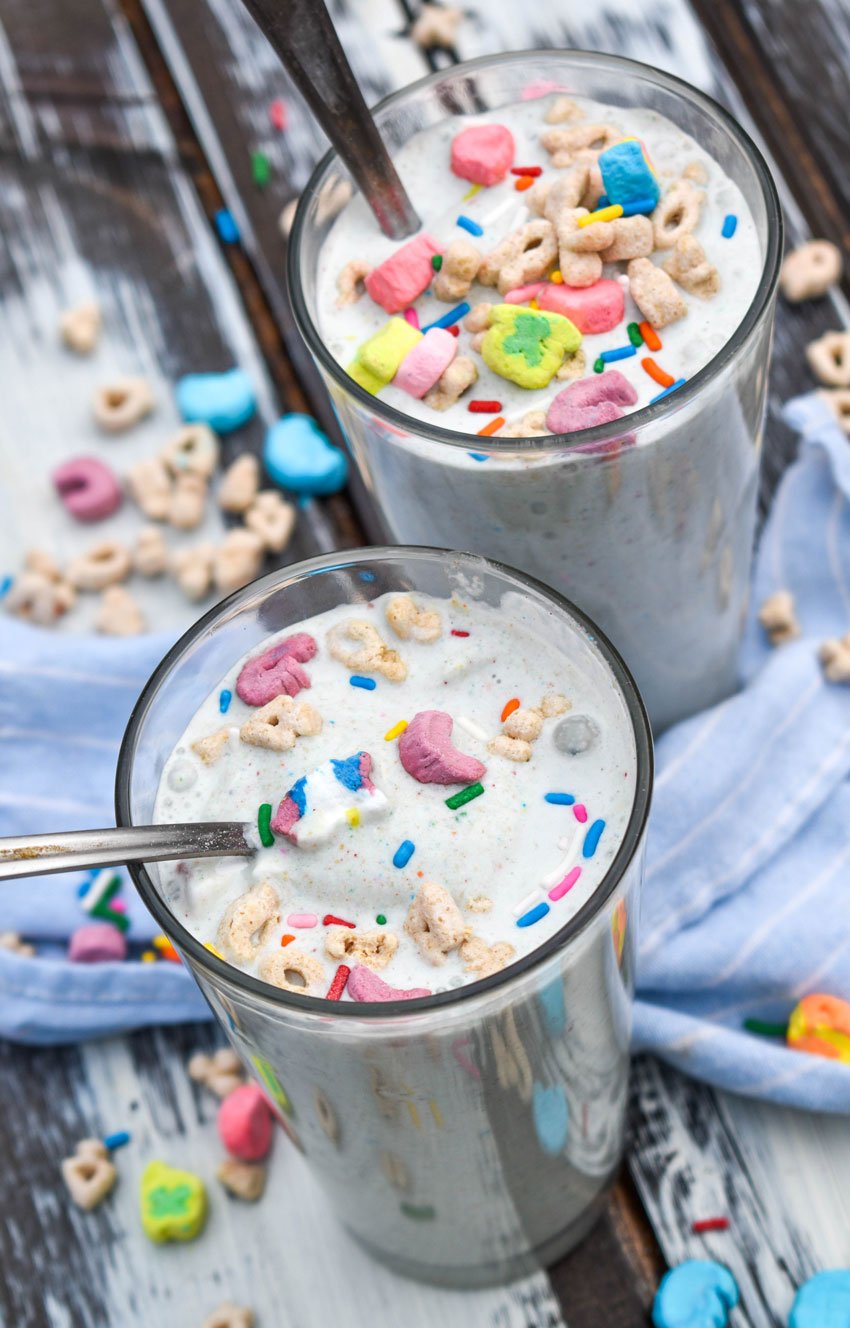 a silver spoon in a glass filled with easy homemade blizzards