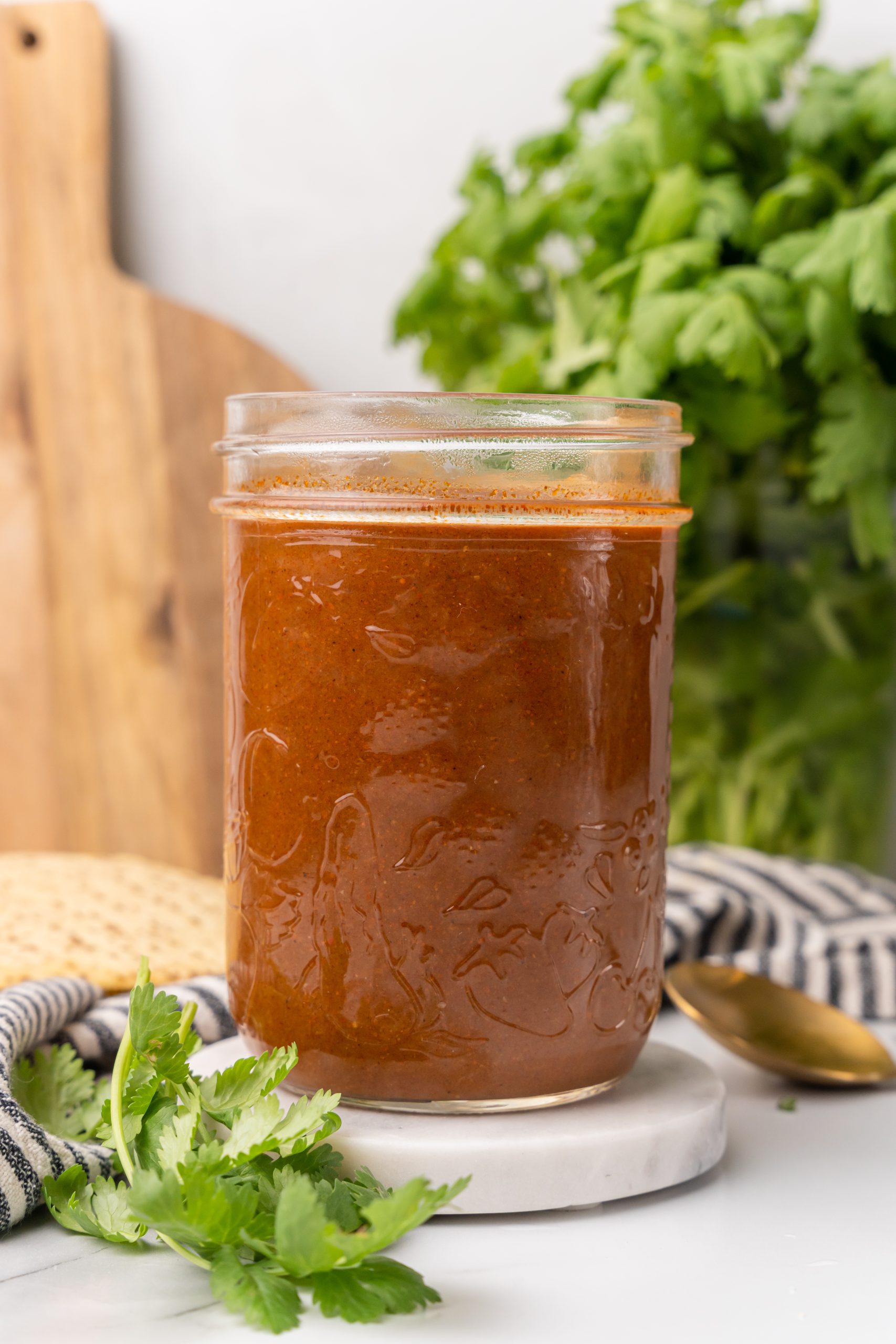 homemade enchilada sauce in a glass mason jar