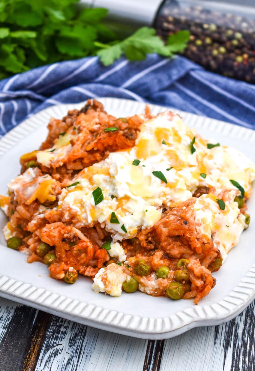 cheesy ground beef and rice casserole on a white plate