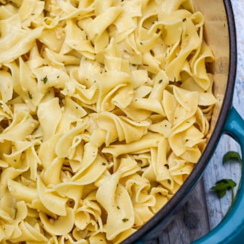 garlic herbed buttered noodles in a large dutch oven