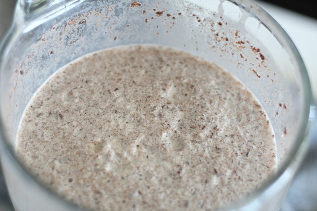 frozen hot chocolate shown in a glass blender