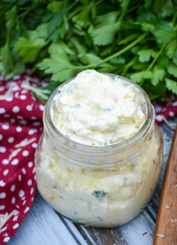 Italian garlic butter spread shown in a glass jar
