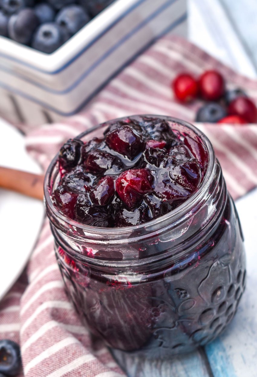cabernet cranberry blueberry sauce in a small glass jar