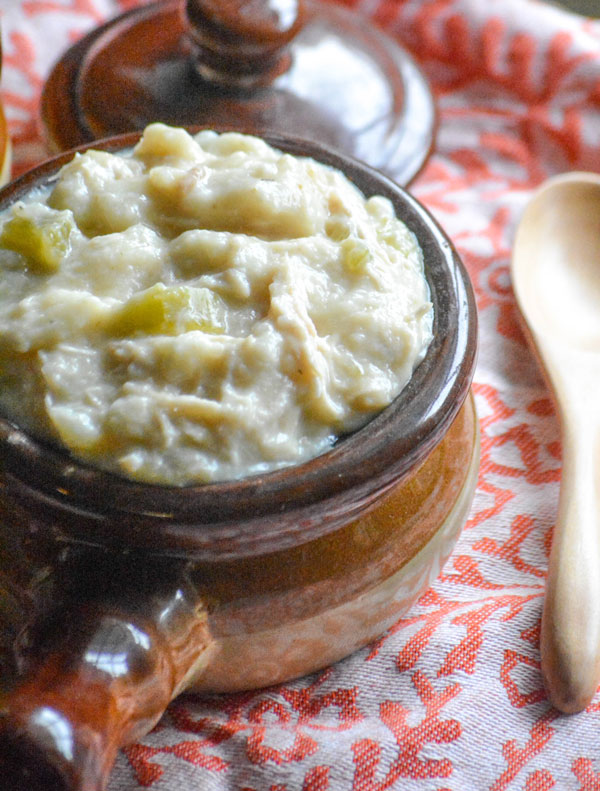 Slow Cooker Chicken & Dumplings served in brown stoneware bowls