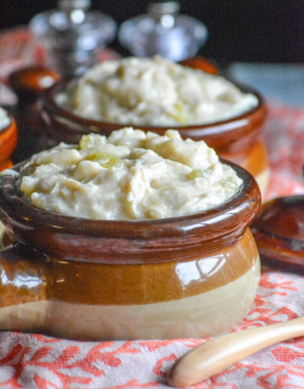 Slow Cooker Chicken & Dumplings served in brown stoneware bowls