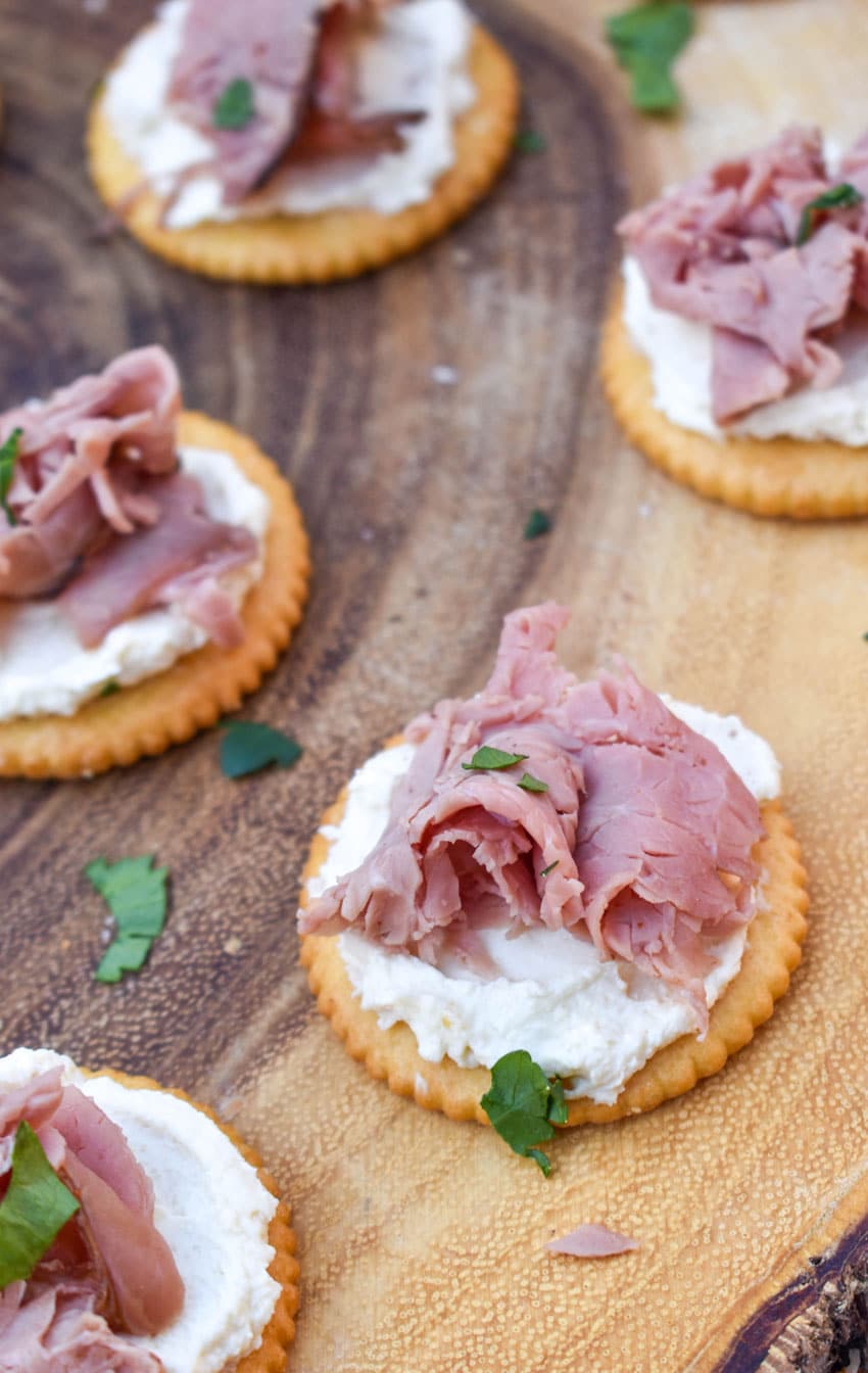 With a little zip from a savory spread, these roast beef and horseradish cream cheese crackers are the perfect savory appetizer. These feisty little crackers are quick and easy to assemble, and make a great option for any gathering, or even a quick grab and go snack.
