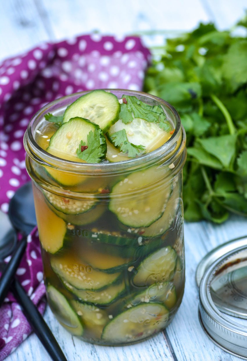 Asian cucumber salad in a vinegar filled mason jar