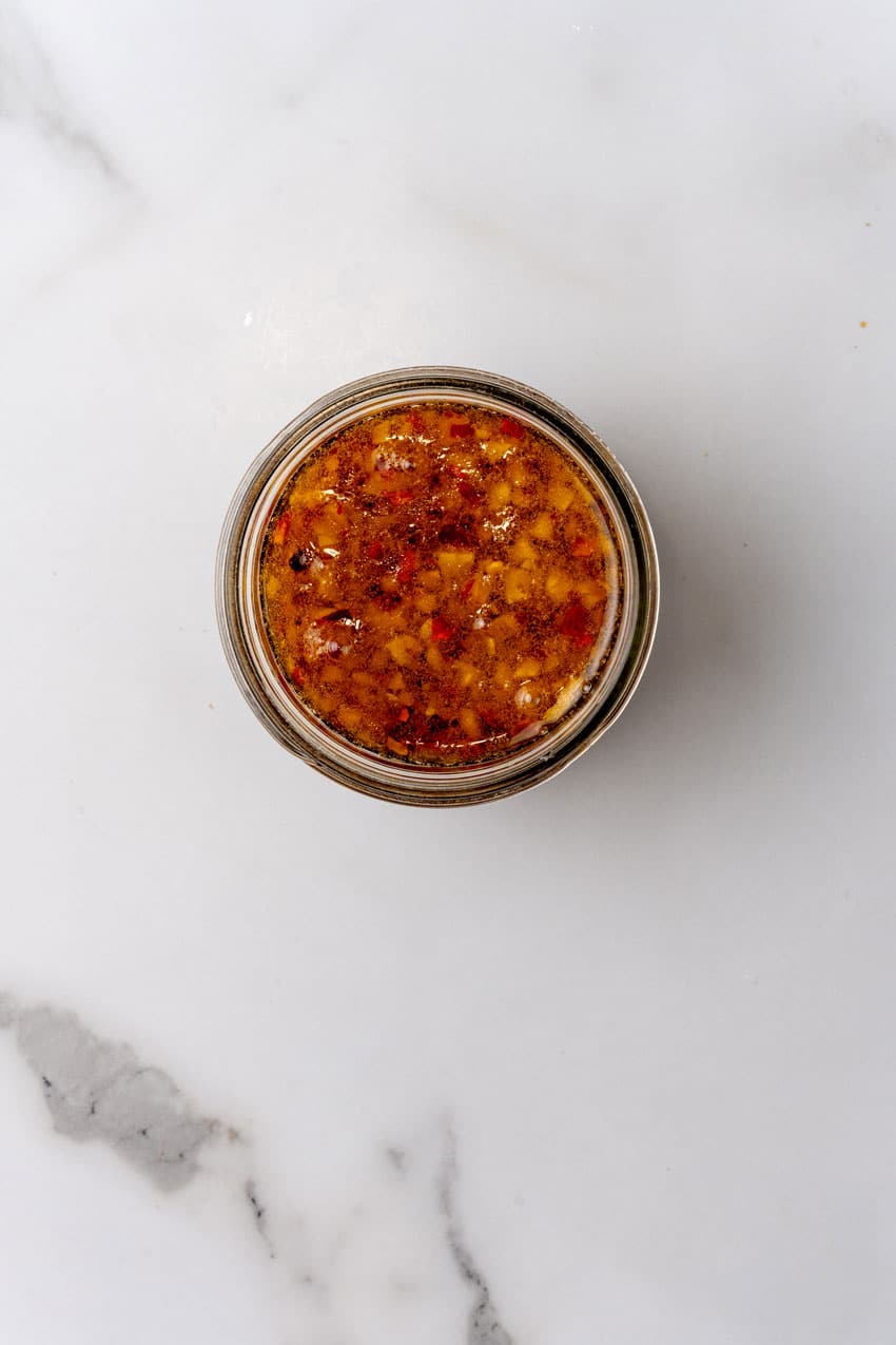 ginger sesame dipping sauce in a small glass bowl