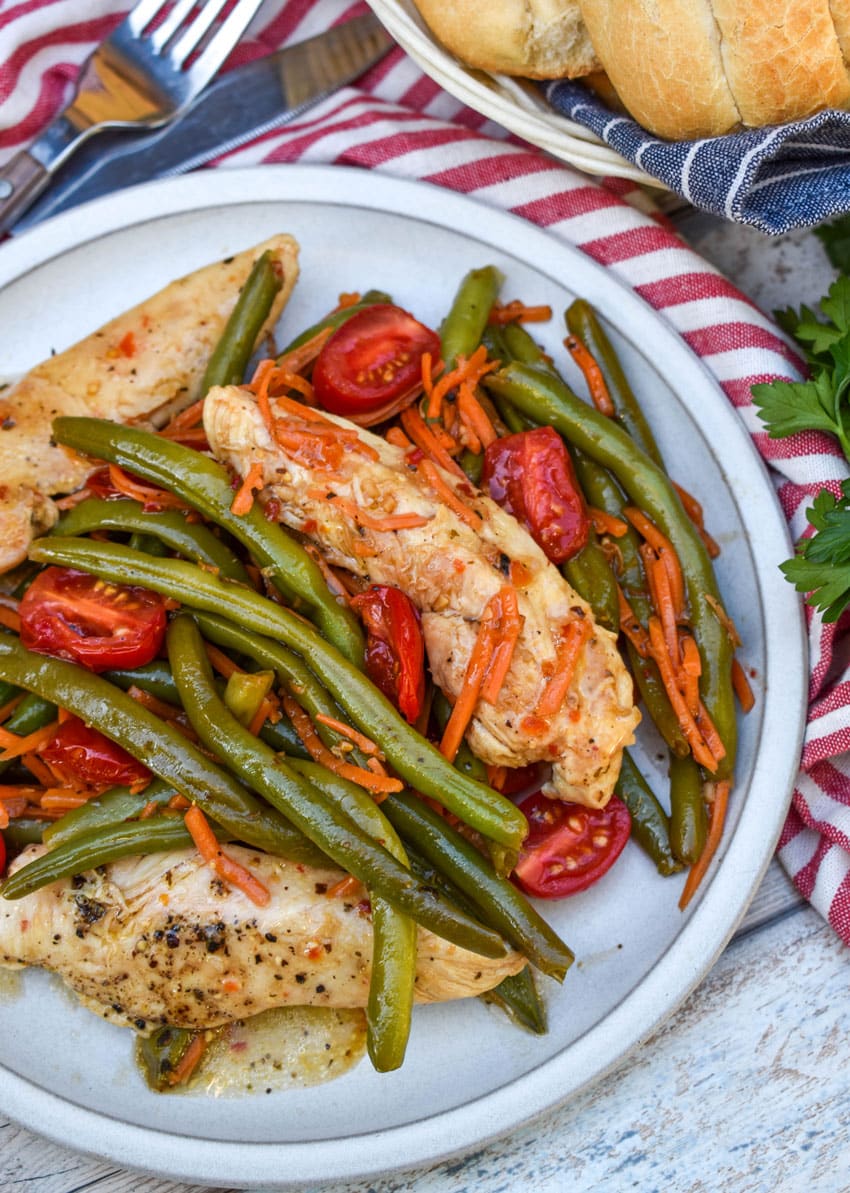 one pot balsamic chicken and veggies on a white plate