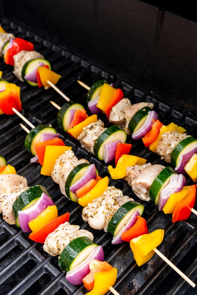 Greek chicken kebabs on a hot grill