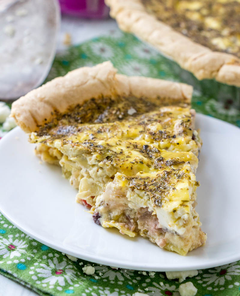 Greek Quiche with sun dried tomatoes, marinated artichokes, kalamata olives, and feta cheese