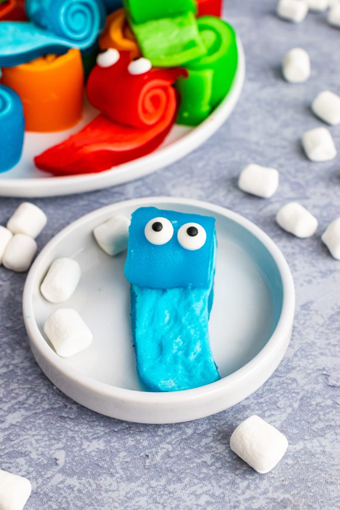 jello marshmallow pinwheel monster tongues on white plates with edible candy eyes