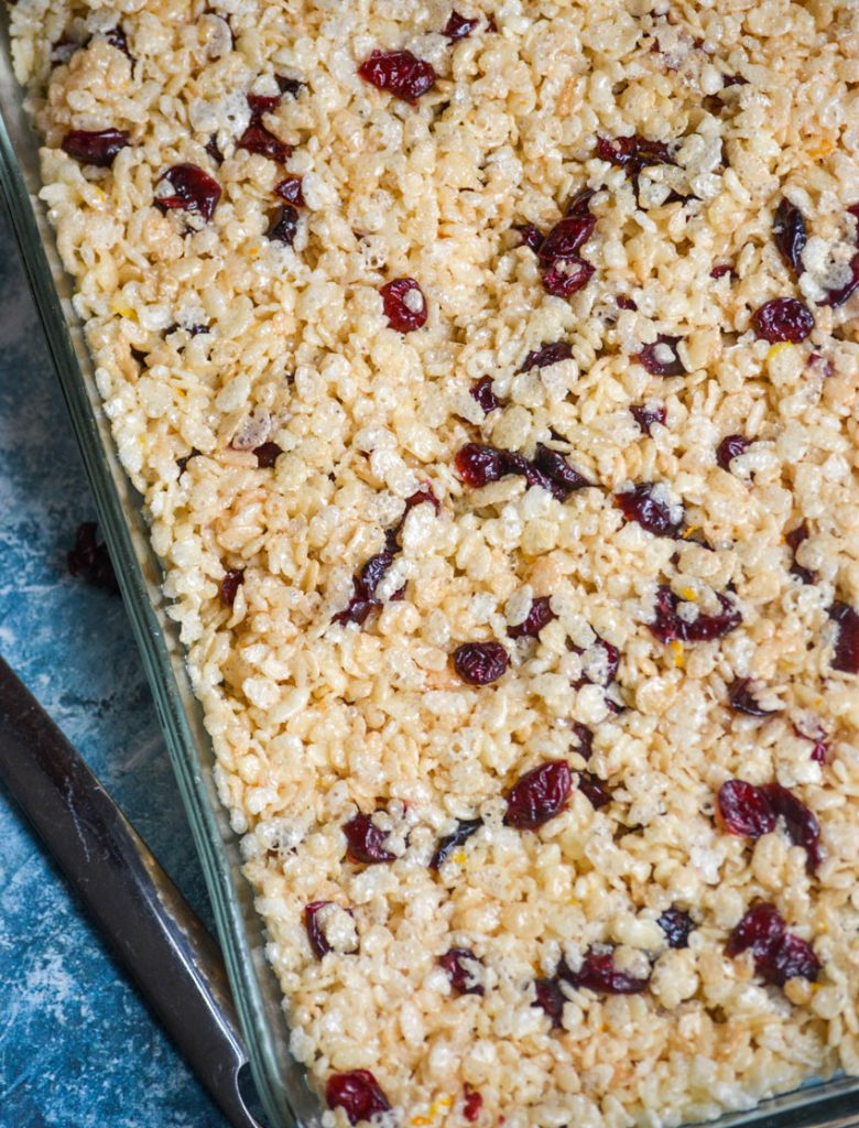 a 9x13" glass dish filled with cranberry orange rice krispies