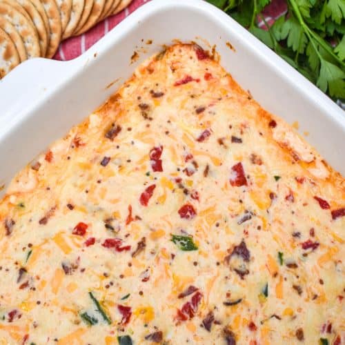 hot pimento cheese dip in a white baking dish