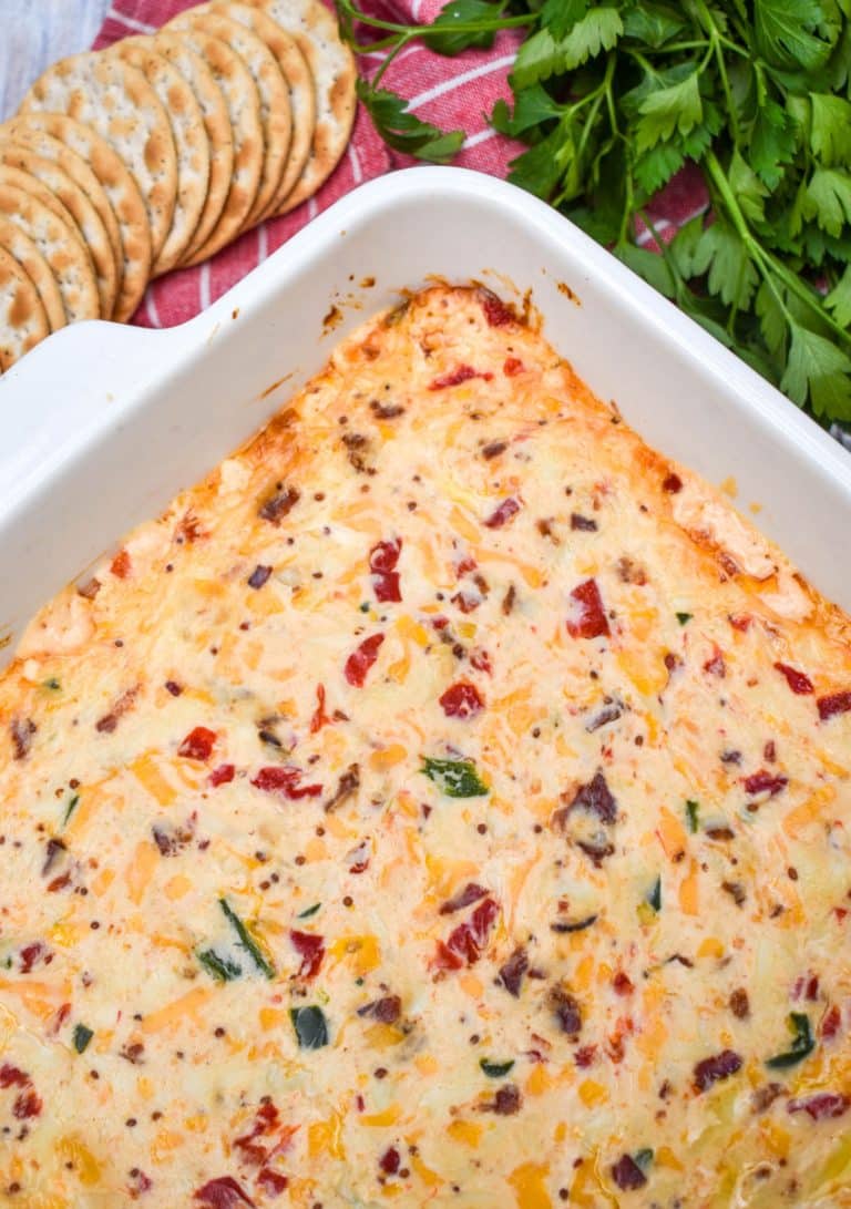 hot pimento cheese dip in a white baking dish