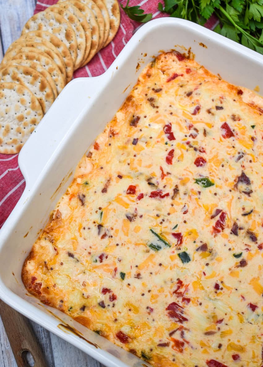 hot pimento cheese dip in a white baking dish