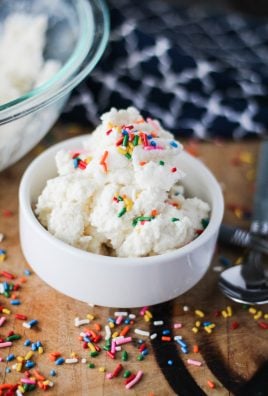 a bowl full of homemade snow cream topped with rainbow sprinkles