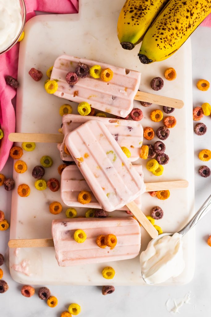 milk and cereal breakfast pops on a cutting board
