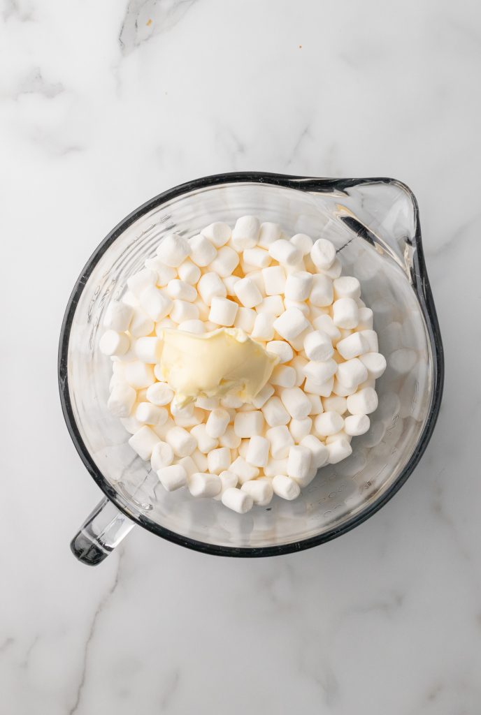marshmallows in a glass measuring jar