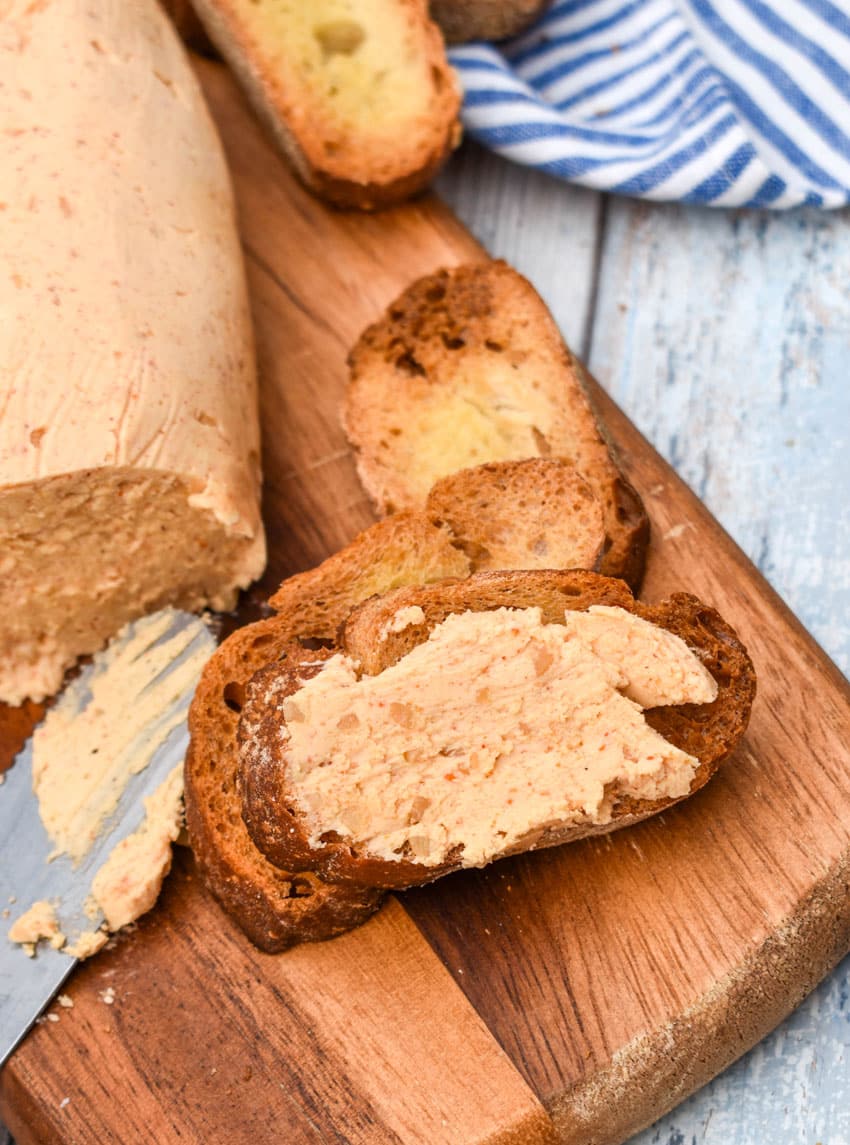 homemade sriracha honey flavored butter spread on a crispy crostini