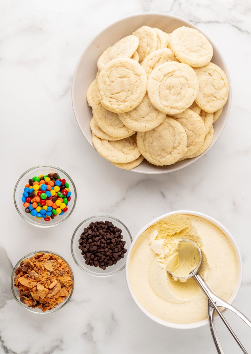 an overhead image showing the measured ingredients needed to make a batch of homemade sugar cookie ice cream sandwiches