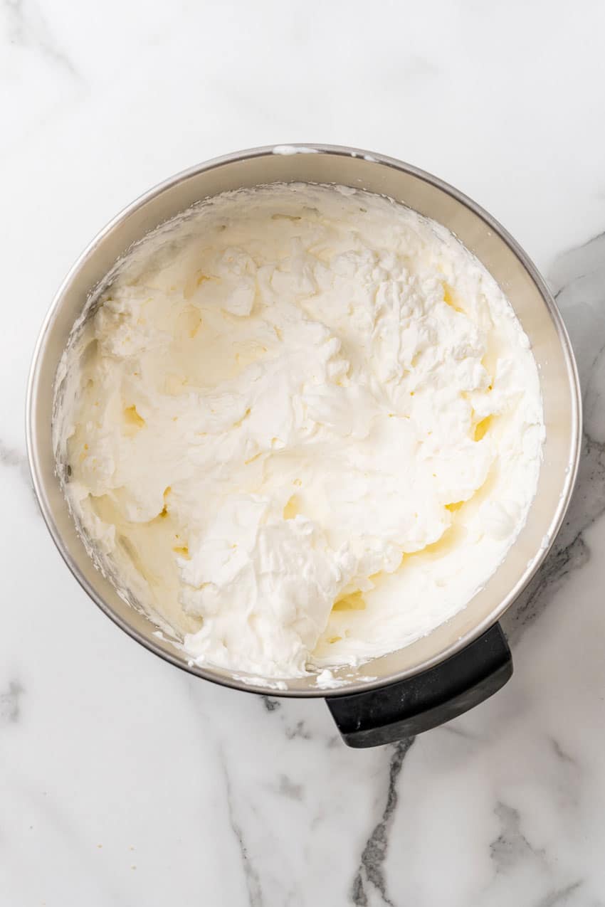 freshly whipped cream in a metal pot