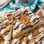 a silver spatula lifting up a slice of s'mores ice cream pie