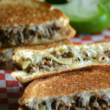 A STACK OF GROUND BEEF PHILLY CHEESESTEAK GRILLED CHEESES