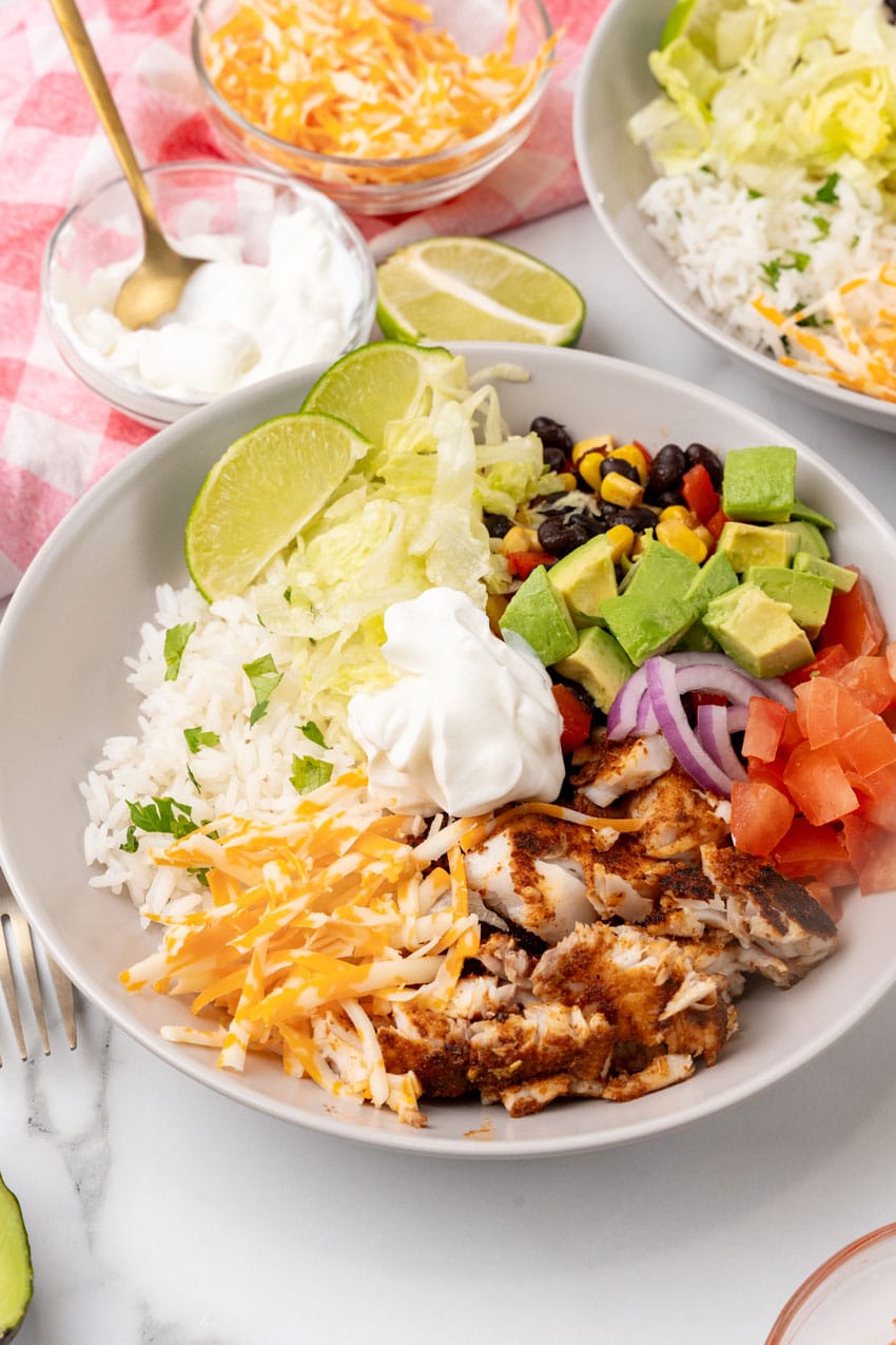 a blackened tilapia bowl on a white countertop