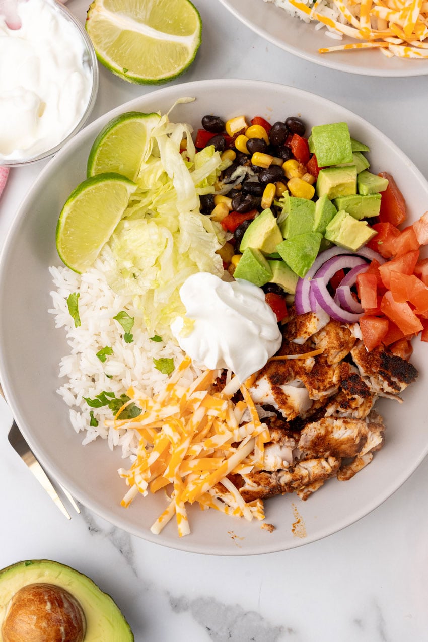 a blackened tilapia bowl on a white countertop