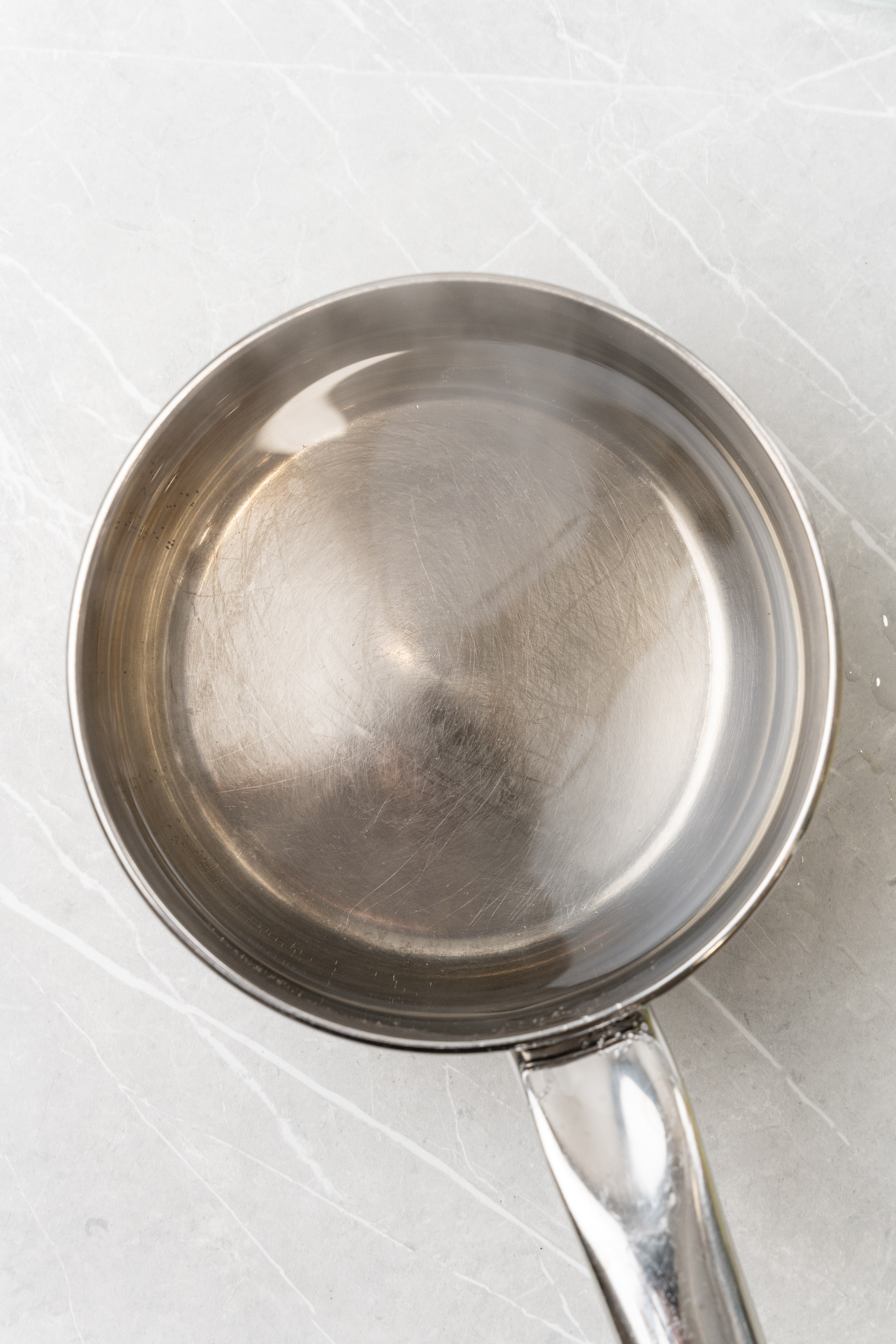 simple syrup in a small metal sauce pan
