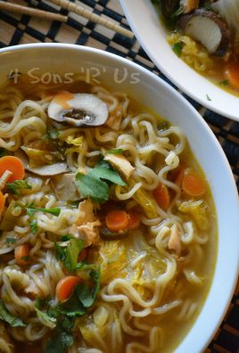 Asian chicken noodle soup with ramen in a white bowl