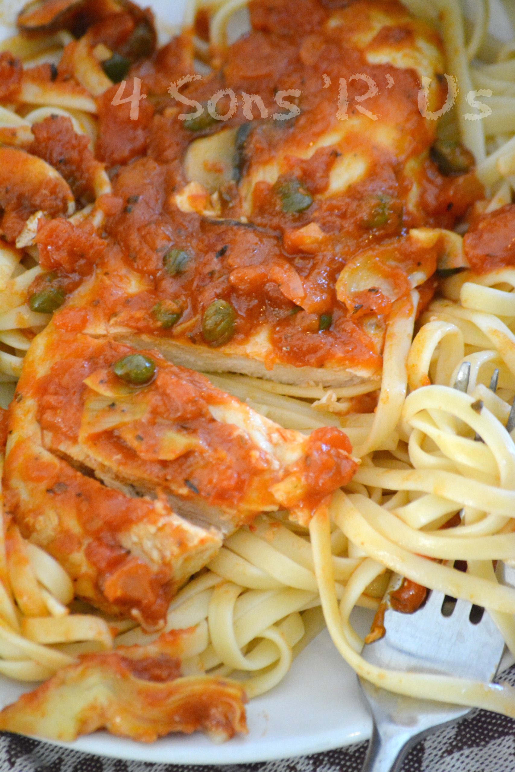 6 INGREDIENT TUSCAN CHICKEN OVER LINGUINI PASTA ON A WHITE DINNER PLATE