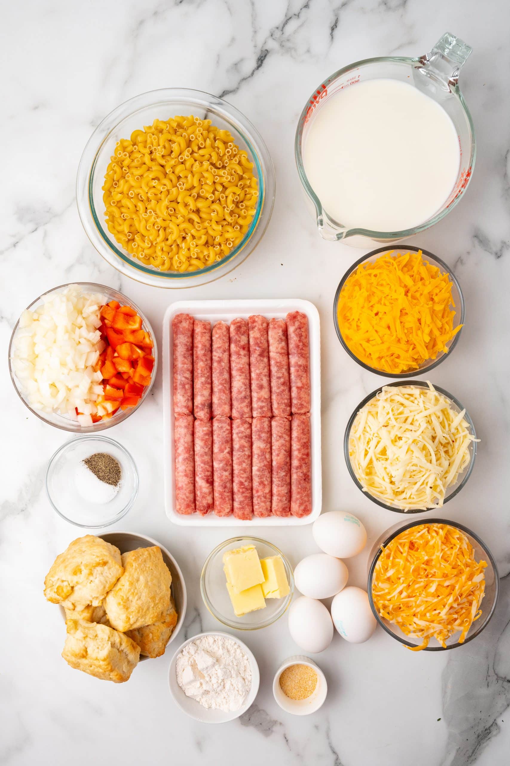 an overhead image showing the measured ingredients needed to make a batch of breakfast mac and cheese
