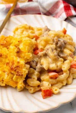creamy breakfast mac and cheese on a white plate