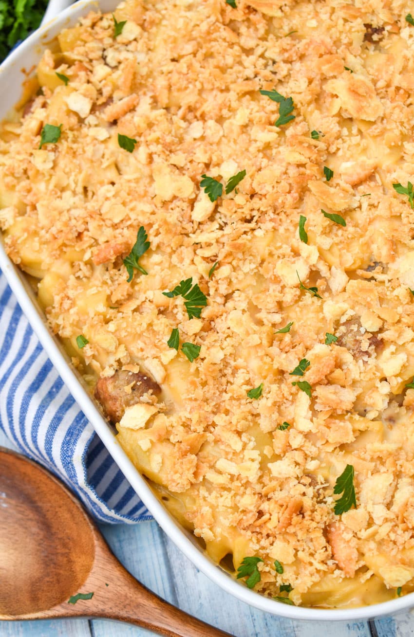 mac and cheese with meatballs in a white baking dish