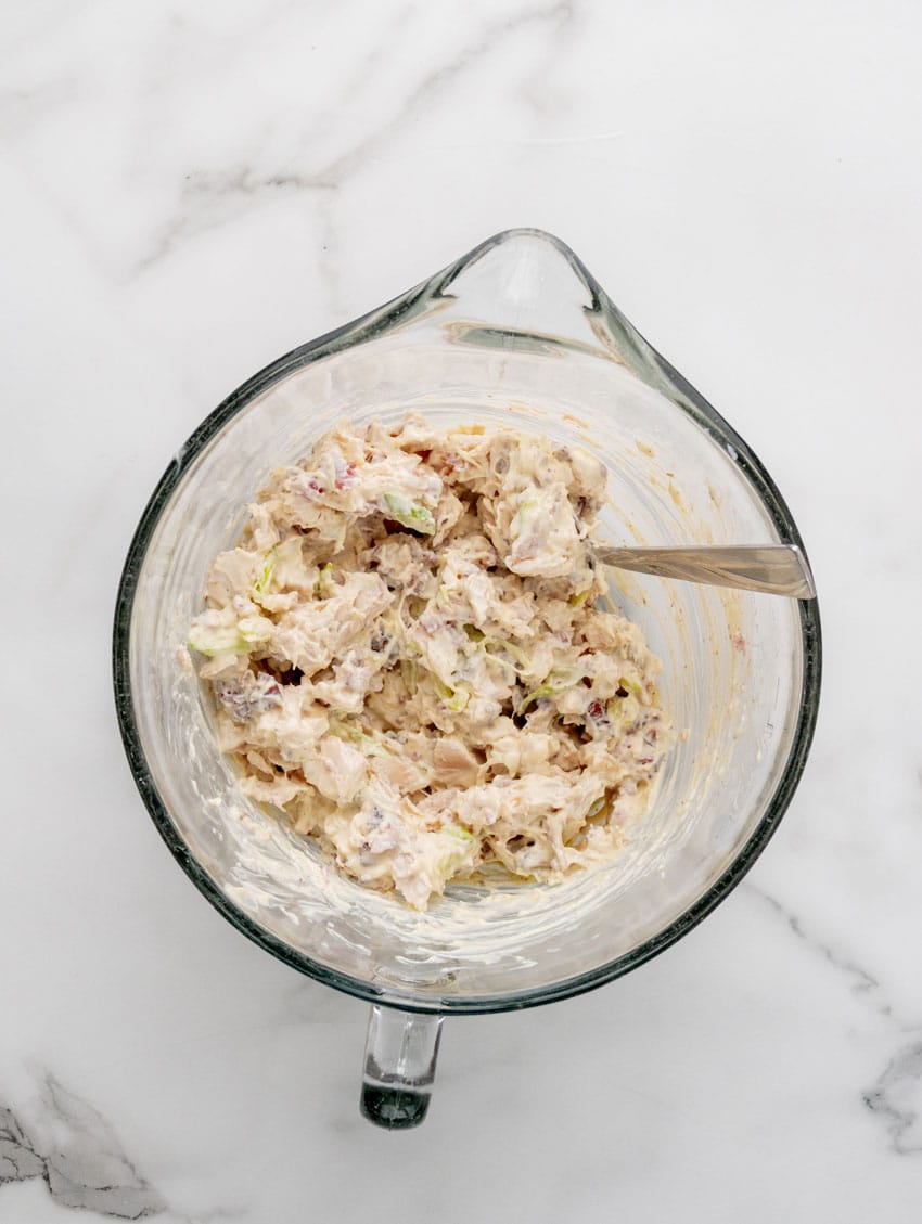 creamy bacon ranch chicken salad in a glass mixing bowl