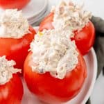 CHICKEN BACON RANCH SALAD STUFFED TOMATOES ON A WHITE SERVING PLATTER