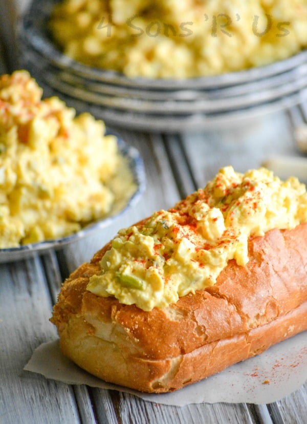 deviled egg salad served on top of a crispy baguette