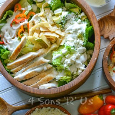 mexican caesar salad in a wooden bowl
